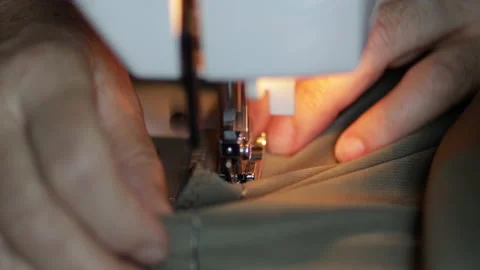 Sewing machine on clothes and material. Tailor at work. Close up. Art of sewing Video stock 135142739
