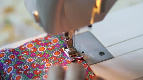 Sewing machine on clothes and material. Tailor at work. Close up. Art of sewing Video stock 135150768