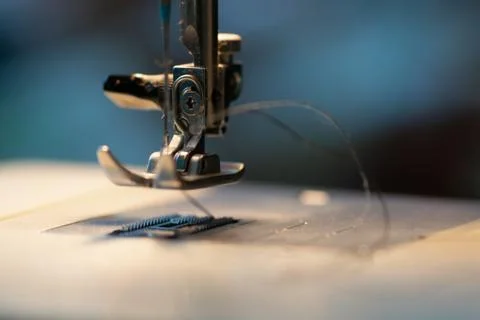 Sewing machine. Detail on thread and needle. Stock Photos