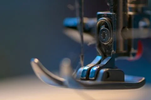 Sewing machine. Detail on thread and needle. Stock Photos