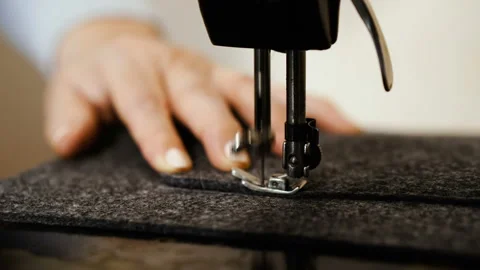 Sewing machine. Elderly hands sew on a sewing machine. Stock Footage 101126962