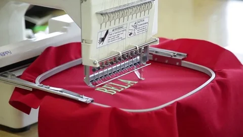 Sewing machine embroider logo Stock Footage 74520209