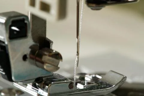 Sewing machine with focus on needle, shallow depth of field Stock Photos
