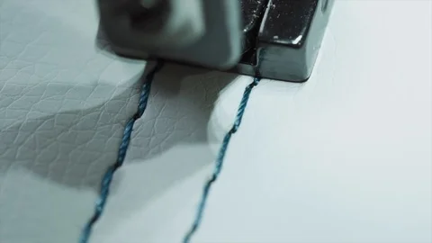 Sewing machine foot doing seam Stock Footage 99815477
