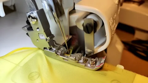 Sewing machine foot scribbling in super slow motion Stock Footage 234816325