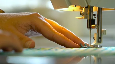 Sewing Machine With Guiding Hand In Slow Motion Stock Footage 127014142