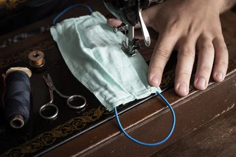 Sewing machine to make mask face fabric, Health care, and coronavirus protect Stock Photos