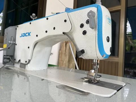 Sewing machine making, 16 June 2022 , Buriram province.	 Stock Photos