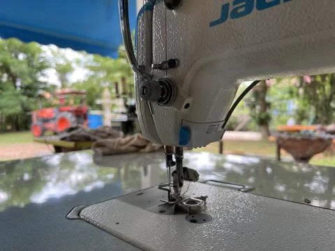 Sewing machine making, 16 June 2022 , Buriram province.	 Stock Photos
