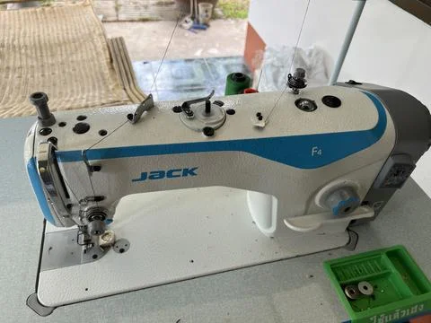 Sewing machine making, 16 June 2022 , Buriram province.	 Stock-Fotos