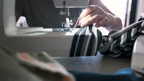 Sewing machine in motion. The close-up of the sewing machine Stock Footage 155178957