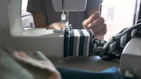 Sewing machine in motion. The close-up of the sewing machine Stock-Footage 155179558