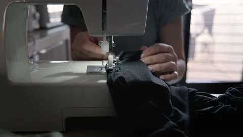 Sewing machine in motion. The close-up of the sewing machine Stock Footage 155180384