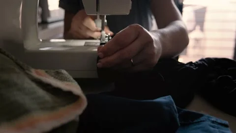 Sewing machine in motion. The close-up of the sewing machine Stock Footage 155180530