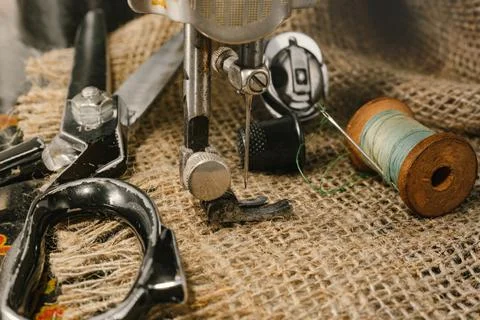 Sewing machine. Needle and thread. Thimble. Scissors. Sewing tools Stock Photos