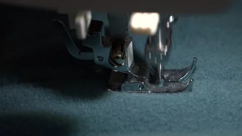 Sewing machine needle with fabric and thread, slow motion, close up. Stock Footage 144202367