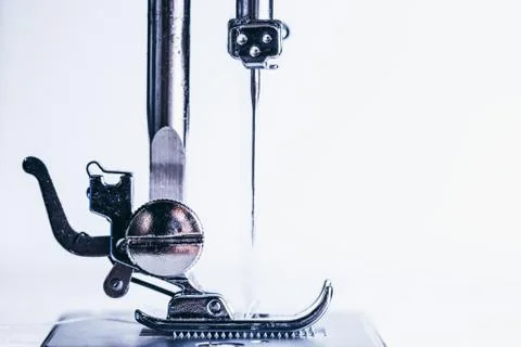 Sewing machine needle isolated on white. Stock Photos