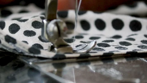 Sewing Machine Needle in Motion. Close-up of sewing machine needle rapidly mo Stock Footage 120495889