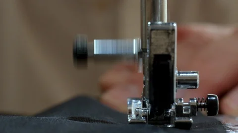 Sewing Machine Needle in Motion: Close-up of sewing machine needle rapidly Stock Footage 127571375
