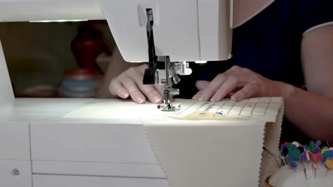 Sewing machine needle in motion. Close-up of a sewing machine needle moving up Stock Footage 141747484