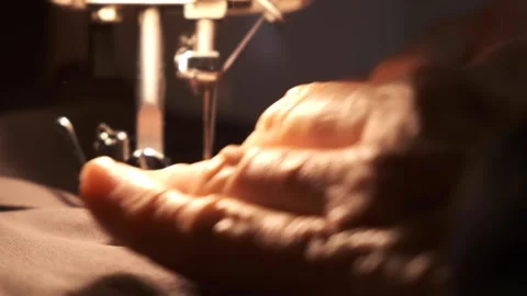Sewing machine Needle in motion. close-up of sewing machine needle quickly moves Stock Footage 228232278
