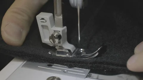 Sewing machine needle in motion Stock Footage 128093276