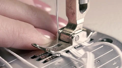 Sewing machine. The needle in the sewing machine sews the fabric. Close-up. Stock Footage 155817492