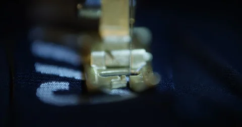 Sewing machine needle sews silk fabric Stock Footage 108795917