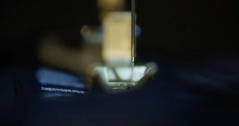Sewing machine needle sews silk fabric Stock Footage 108799829