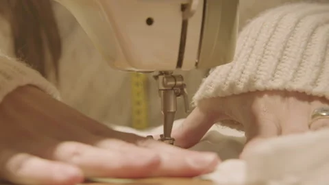 Sewing machine with operating women Video stock 220014574