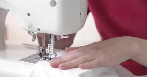 Sewing machine operation process Stock Footage 131614002