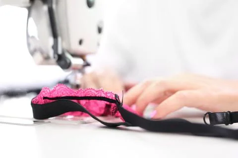 Sewing on a machine. Stock Photos
