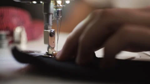 The sewing machine is in the process of working Stock Footage 244732574