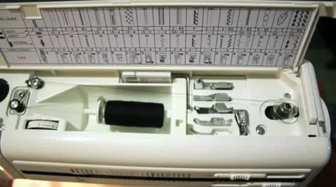 Sewing machine pulls the thread on the bobbin Stock Footage 14808642