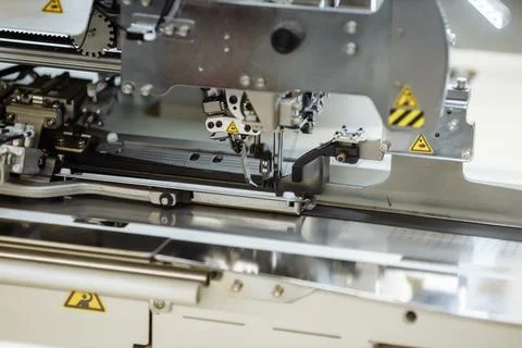 Sewing machine scribbling fabric. tailoring at the factory Foto stock
