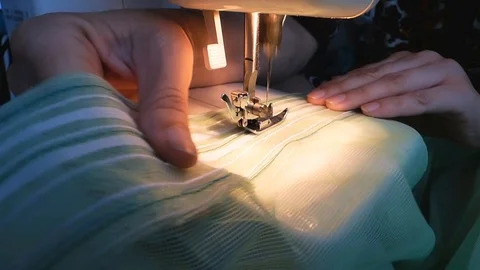 Sewing machine the seamstress Video stock 93735572