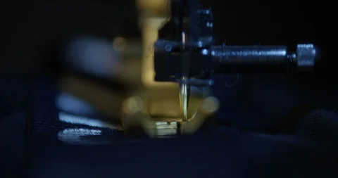 Sewing machine sewing blue fabric Stock Footage 108798136