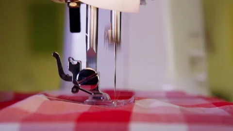 Sewing Machine Sewing Textile with bokeh Stock Footage 243612311