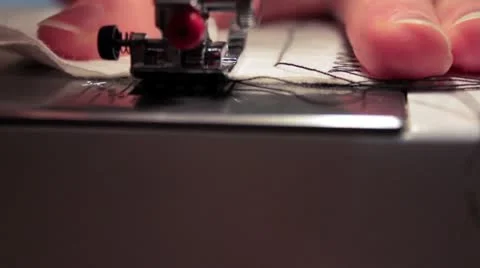Sewing machine sews the seam stitch Stock Footage 14808618