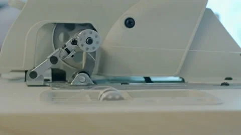 Sewing machine - spinning a bobbin Stock Footage 61250940