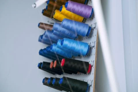 Sewing machine spools with colorful threads Stock Photos