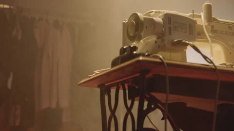 Sewing machine stands in the dark room Stock Footage 220014984
