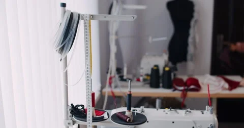 Sewing machine in a tailor shop in slow motion Stock Footage 150392256
