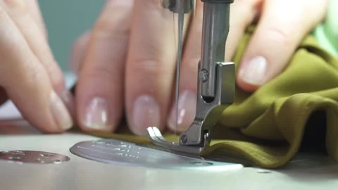 Sewing machine. Tailoring at a textile factory Stock Footage 234651210