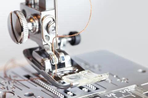 Sewing machine with thread in needle close-up Stock Photos