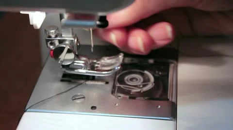Sewing machine thread a needle threader Stock Footage 14808622