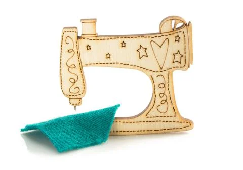 Sewing machine toy on white Stock Photos