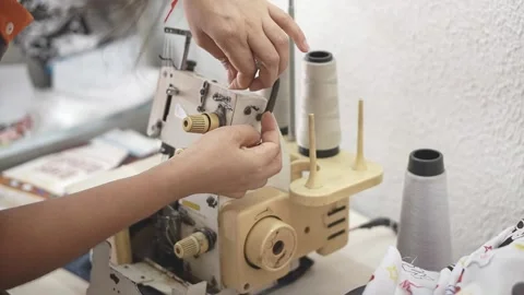 Sewing machine with vintage look. Process of sewing in atelier or workshop. Stock Footage 137679761