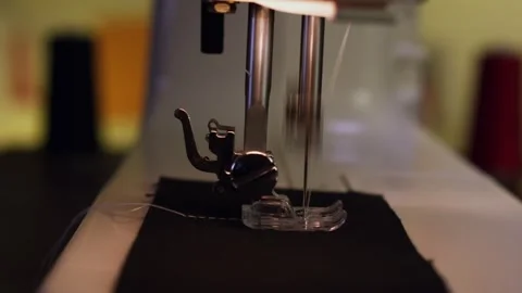 Sewing Machine Working hard all day Stock Footage 243612393