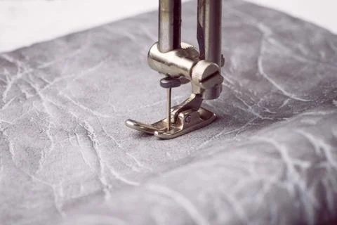 Sewing machine working part with leather Stock Photos